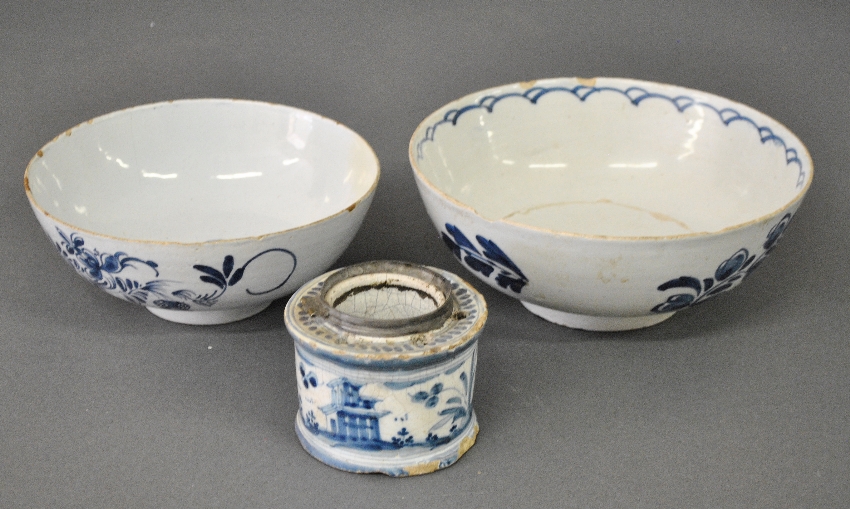 Appraisal: - Two Dutch Delft bowls th c largest h x