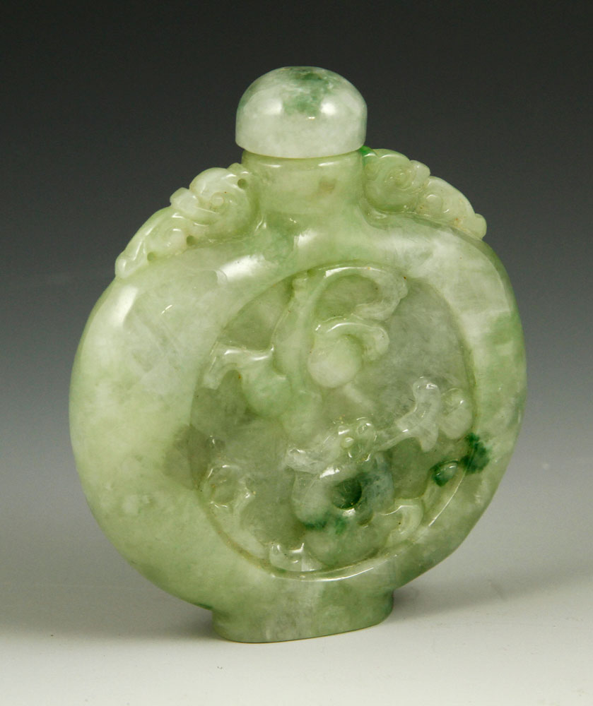 Appraisal: - Chinese Carved Jadeite Snuff Bottle Chinese carved jadeite snuff