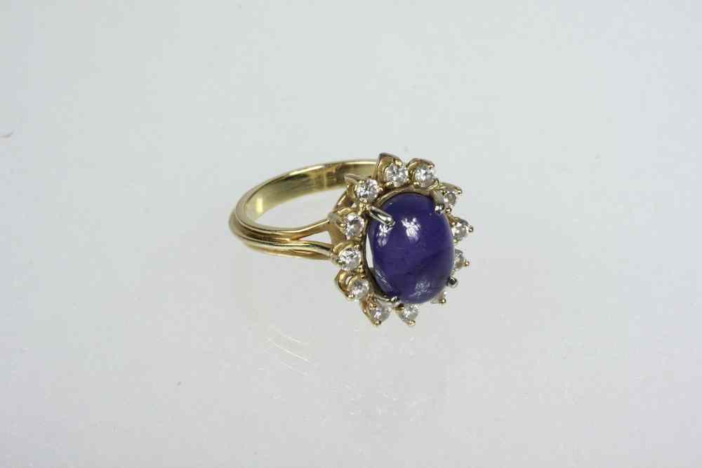 Appraisal: LADY'S RING - K yellow gold diamond and blue star