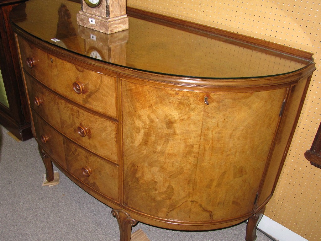 Appraisal: Walnut nine piece dining room suite comprising bow fronted sideboard