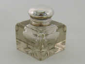 Appraisal: A large standard silver mounted square glass inkwell with star