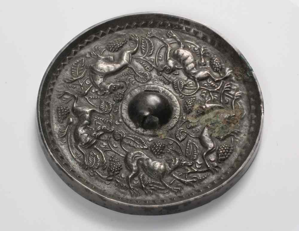 Appraisal: SILVERED BRONZE MIRROR -Chinese Tang Dynasty Finely cast disc with