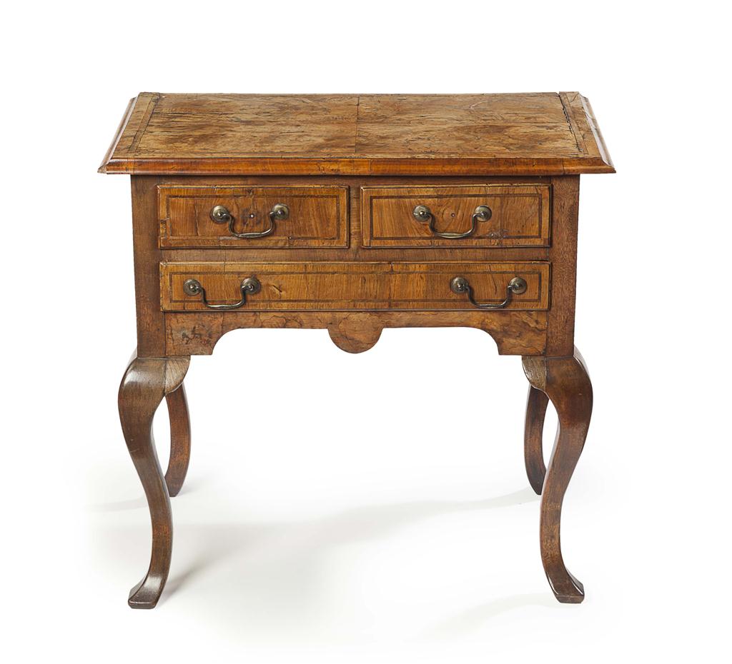 Appraisal: GEORGE II WALNUT LOWBOY MID TH CENTURY the moulded featherbanded