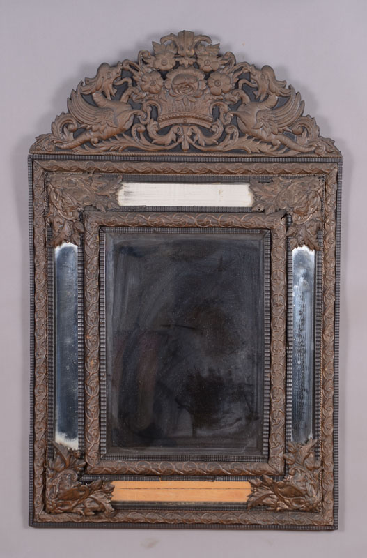 Appraisal: Flemish Baroque Style Embossed Metal and Ebonized Mirror The central