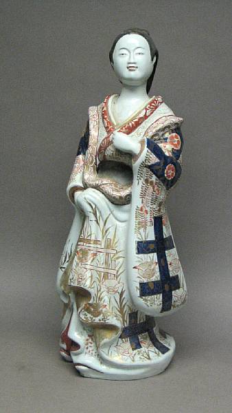 Appraisal: A Japanese style European glazed pottery figure Depicting a Kambun