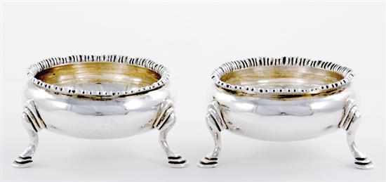 Appraisal: Early pair George III sterling salt cellars London dated gadroon