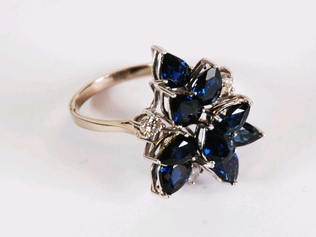 Appraisal: ct WHITE GOLD DIAMOND AND SAPPHIRE DRESS RING with a