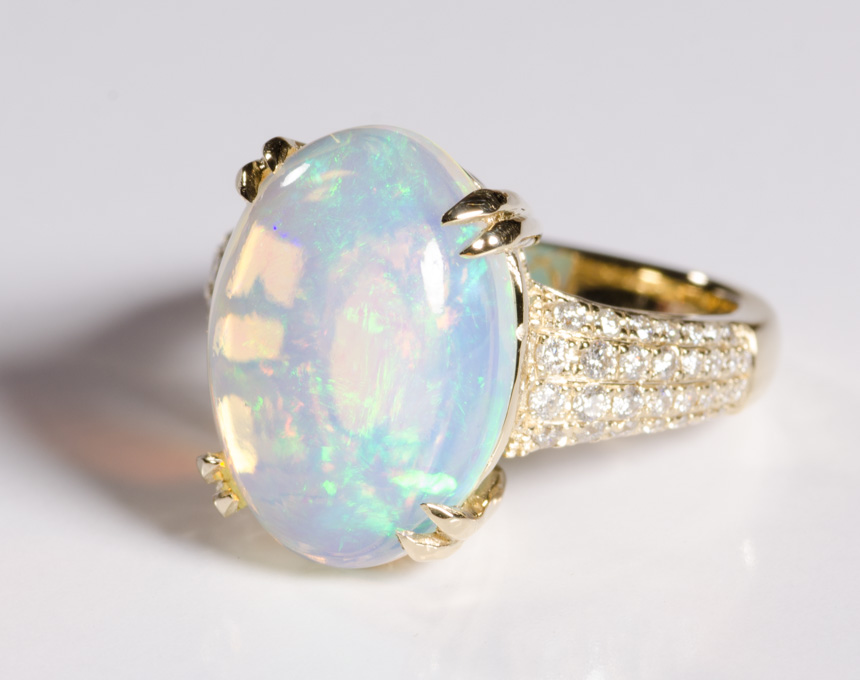 Appraisal: OPAL DIAMOND AND FOURTEEN KARAT GOLD RING featuring a large