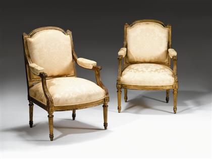 Appraisal: Pair of Louis XVI style giltwood fauteuils a la reine