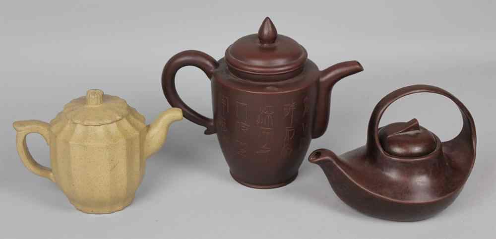 Appraisal: THREE CHINESE YIXING TEAPOTS EACH WITH SEAL MARK Including a