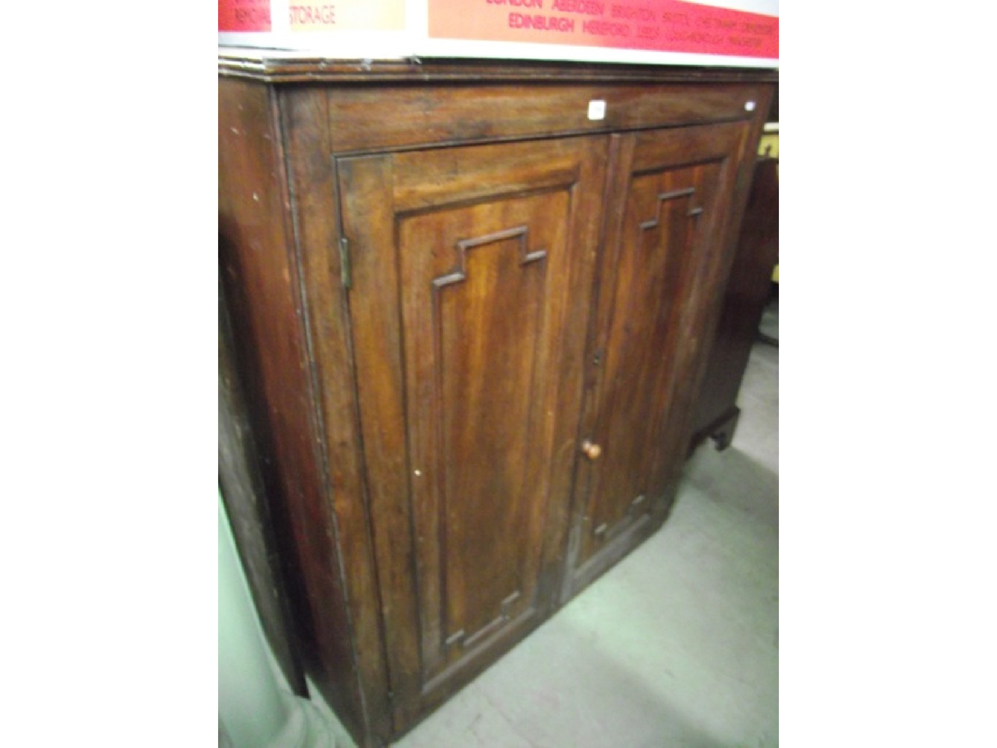 Appraisal: A th century mahogany and pine sided side cupboard enclosed