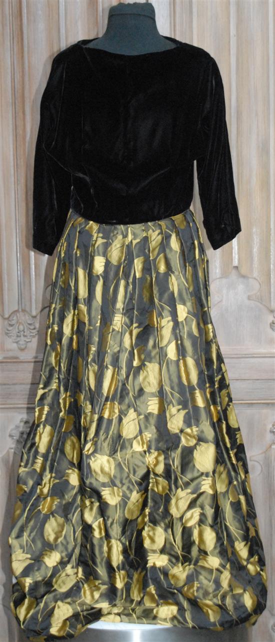 Appraisal: GOWN BLACK VELVET AND CHATREUSE SILK MOTIF Borgdorf Goodman sizes