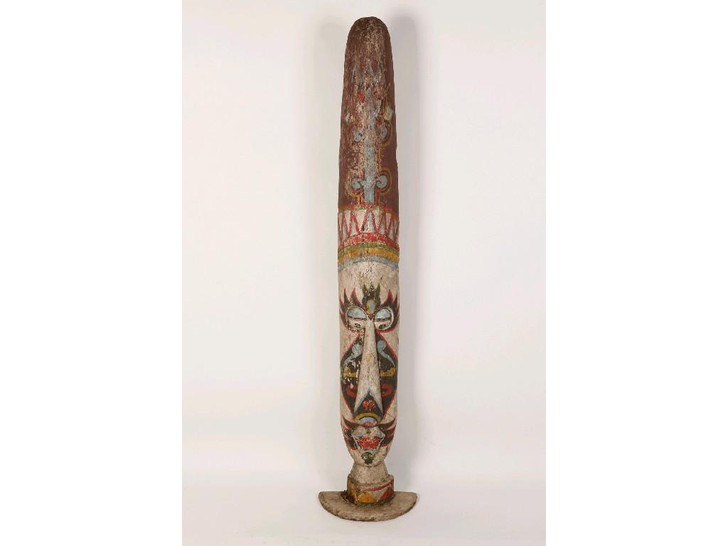 Appraisal: A POLYCHROME AND CARVED WOODEN TOTEM the base decorated with