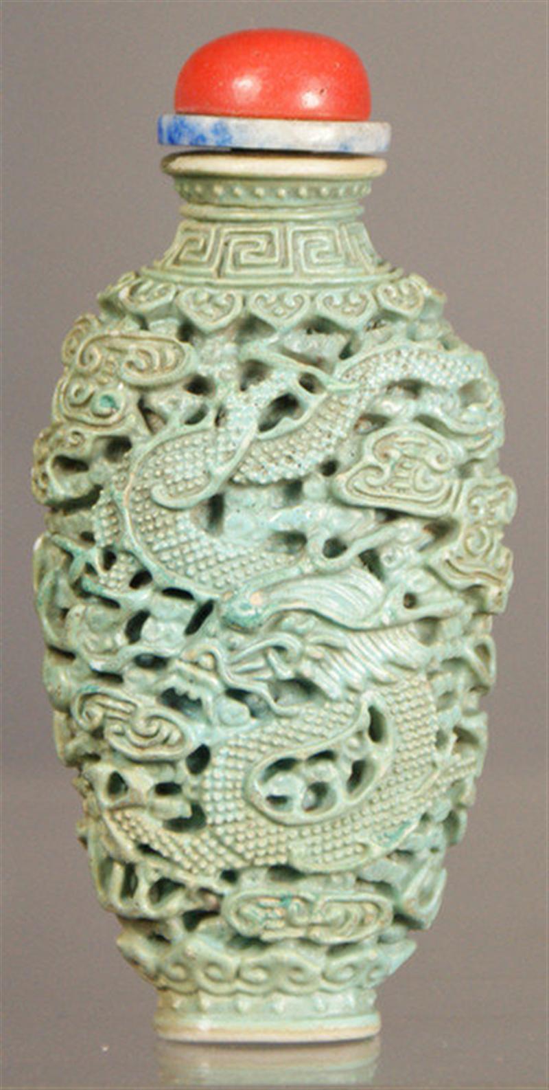 Appraisal: Molded porcelain turquoise colored snuff bottle reticulated phoenix and dragon