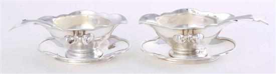 Appraisal: Pair silver gravy boats with ladles scalloped edged ovoid bowl