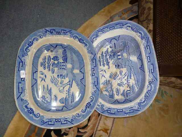 Appraisal: A BLUE AND WHITE MEAT PLATTER decorated with a Willow