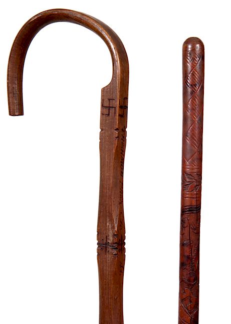 Appraisal: CANES CANES A PAIR OF FOLK ART CANES THE FIRST