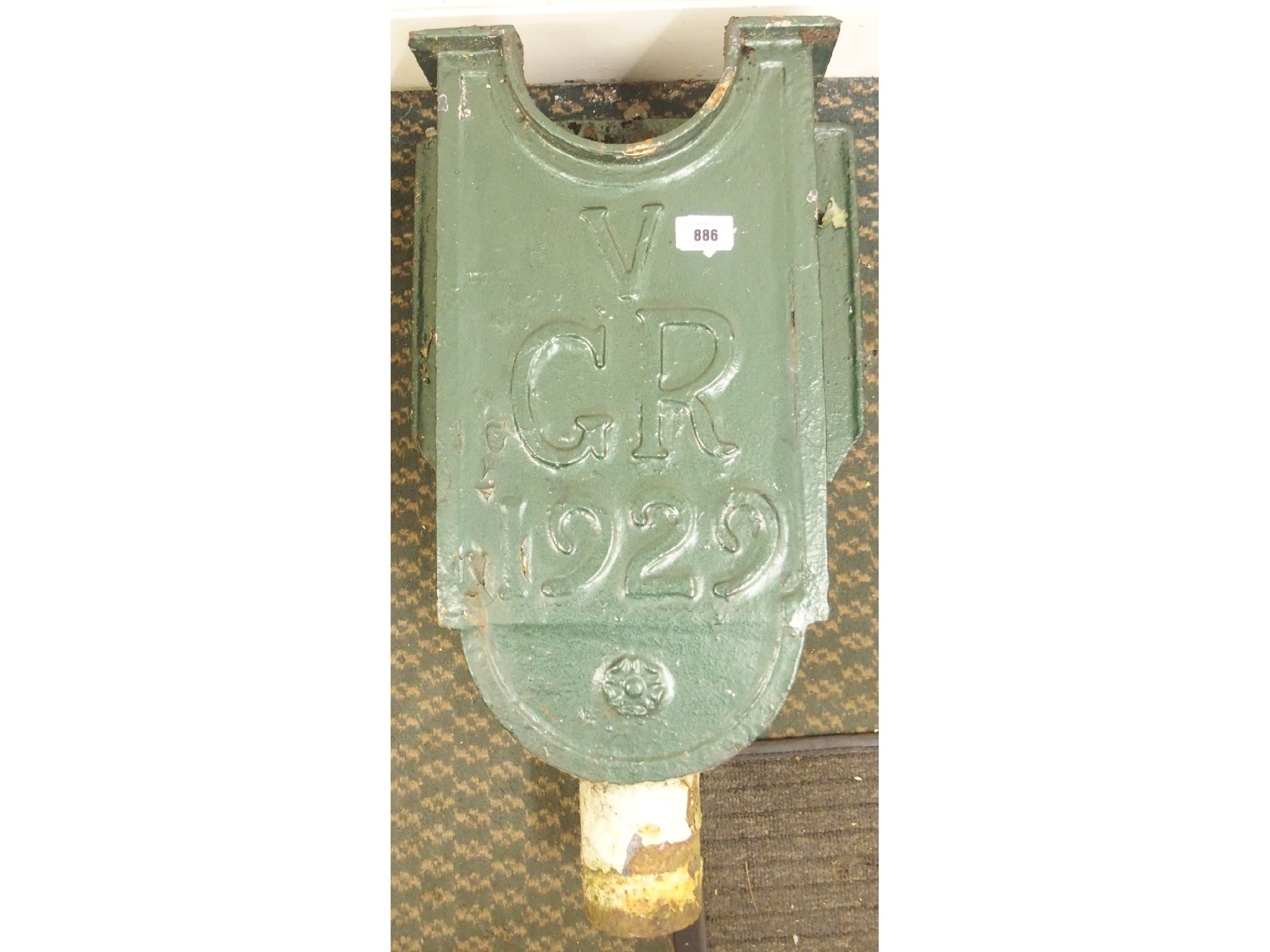 Appraisal: A green cast iron rain hopper GR V