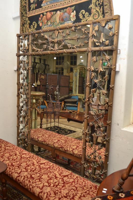 Appraisal: A LARGE DECORATIVE GILT FRAMED MIRROR WITH VINE LEAF MOTIF