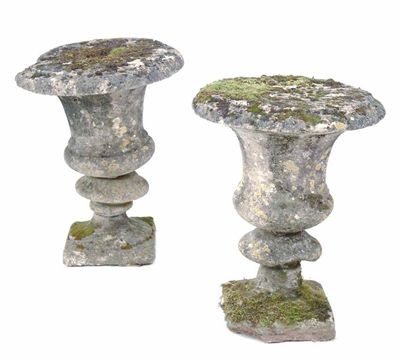 Appraisal: A pair of stone campana shape garden urns in cm