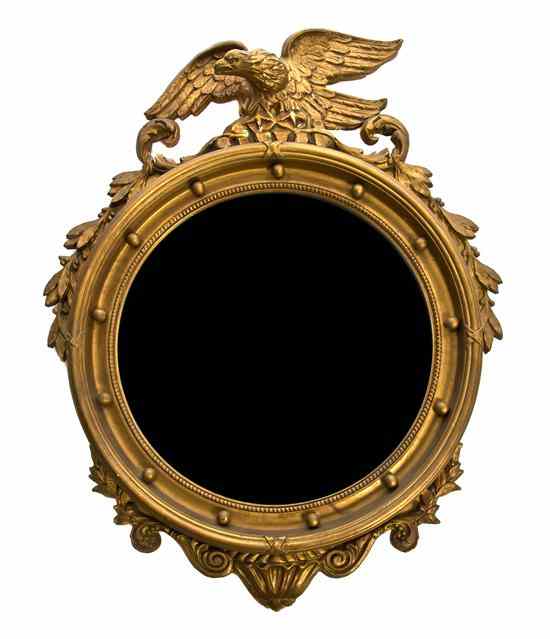 Appraisal: An American Federal Style Giltwood Bull's Eye Mirror having eagle