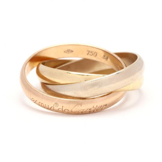 Appraisal: TRI-COLOR GOLD TRINITY RING LE MUST DE CARTIER Three entwined