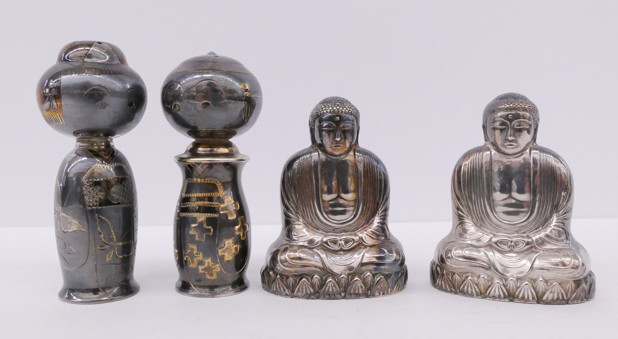 Appraisal: Pairs Japanese Silver Figural Shakers- Kokeshi Doll Buddha- g