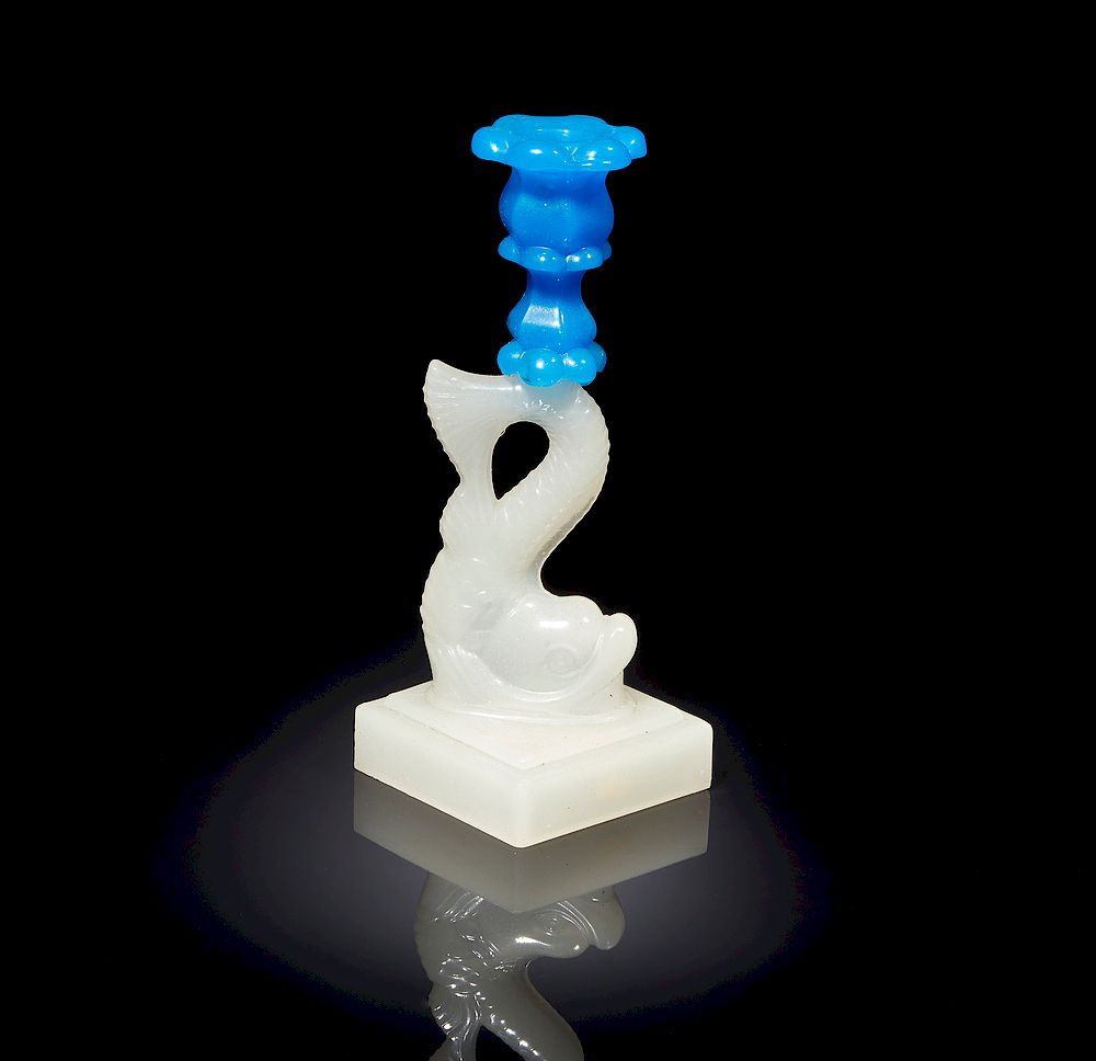 Appraisal: Glass Candlestick Glass dolphin form candlestick Dimensions h Processing and