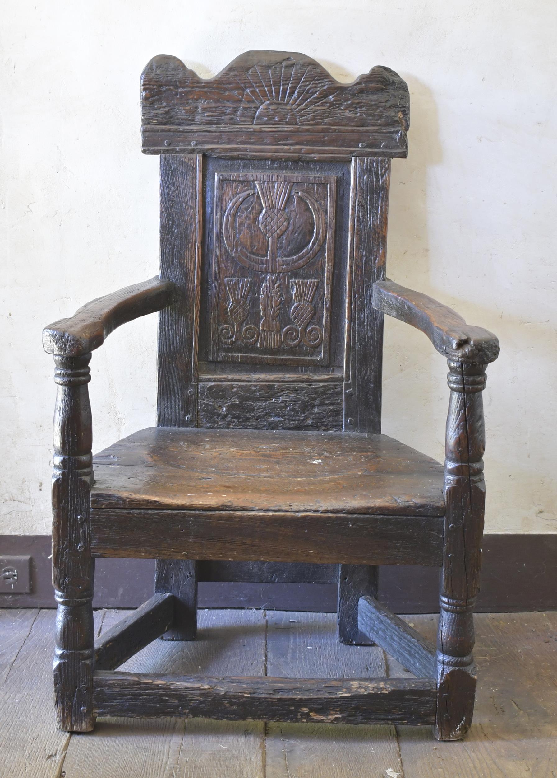 Appraisal: TH C ENGLISH WAINSCOT ARMCHAIR Ca oak armchair possibly Scottish