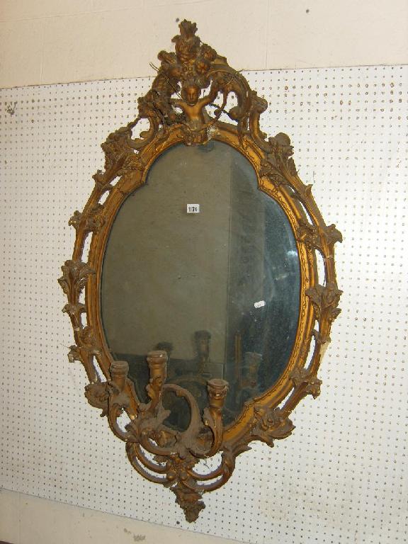 Appraisal: A th century gilt gesso wall mirror of oval form