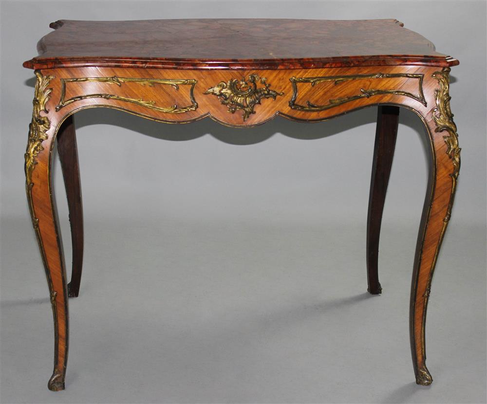 Appraisal: VICTORIAN ORMOLU MOUNTED TULIPWOOD CENTER TABLE IN THE FRENCH TASTE