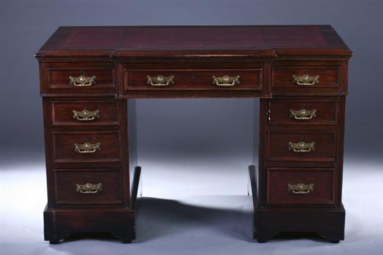 Appraisal: GEORGIAN STYLE MAHOGANY DOUBLE-PEDESTAL DESK Late th century Tooled leather