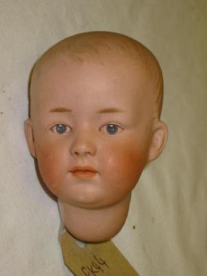 Appraisal: A Gebruder Heubach bisque dolls head with intaglio eyes and