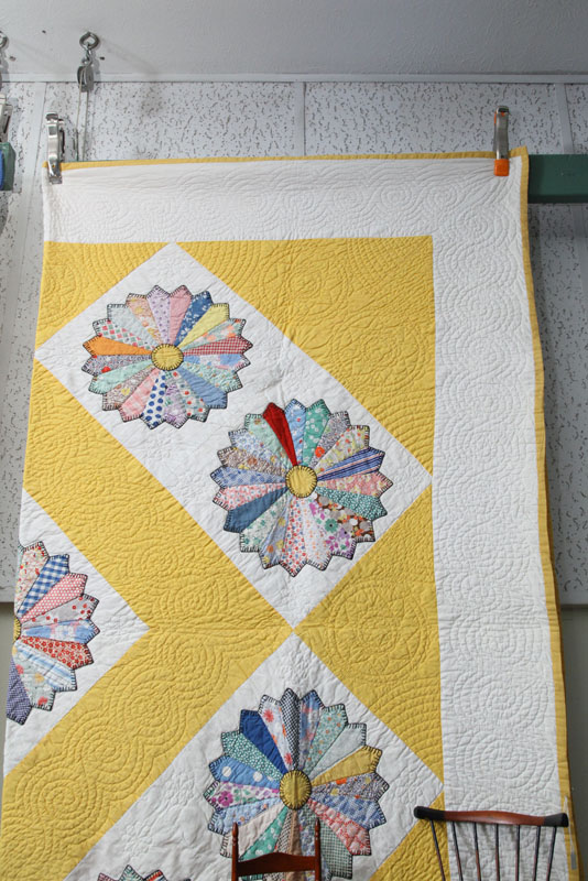 Appraisal: PIECED QUILT Dresden Plate pattern with white and yellow borders