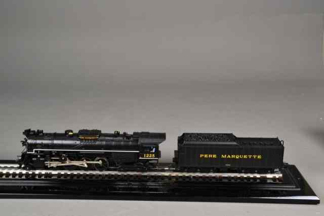 Appraisal: LIONEL LOCOMOTIVE AND TENDERIncluding Pere Marette Berkshire Steam Locomotive ''