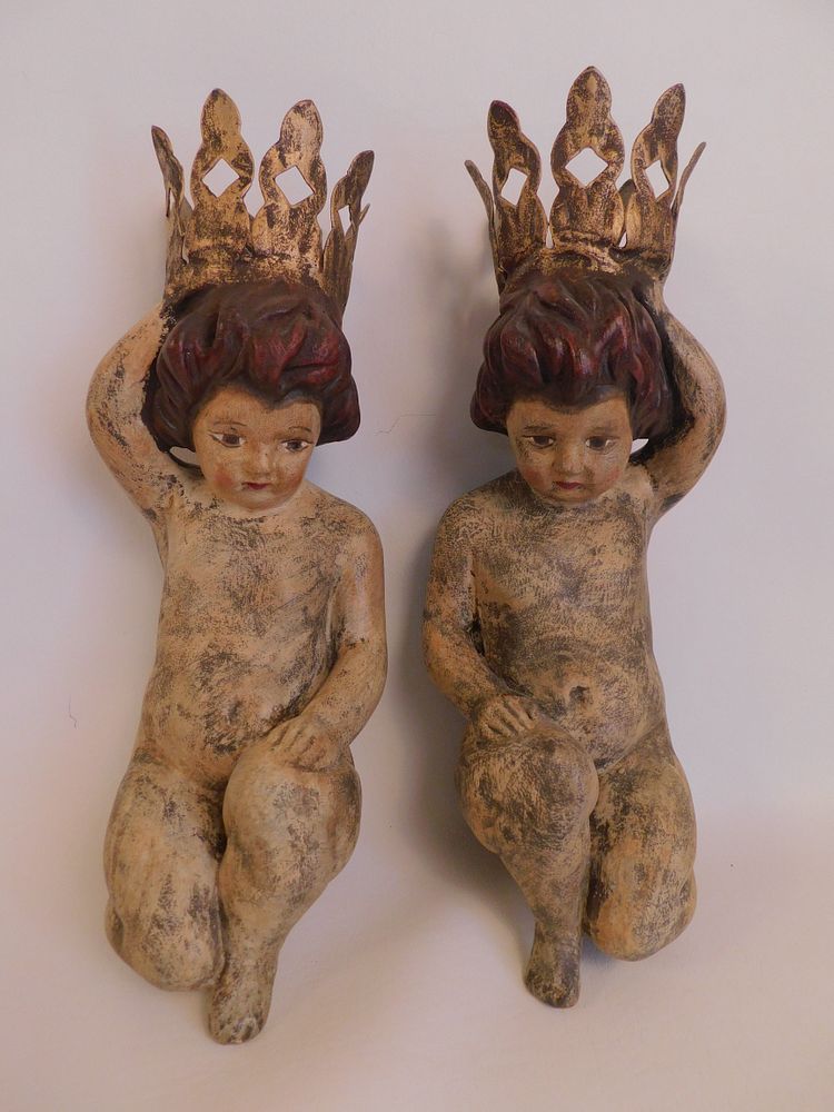 Appraisal: PAIR CHERUB WALL PLAQUES Pair of decorative th century painted