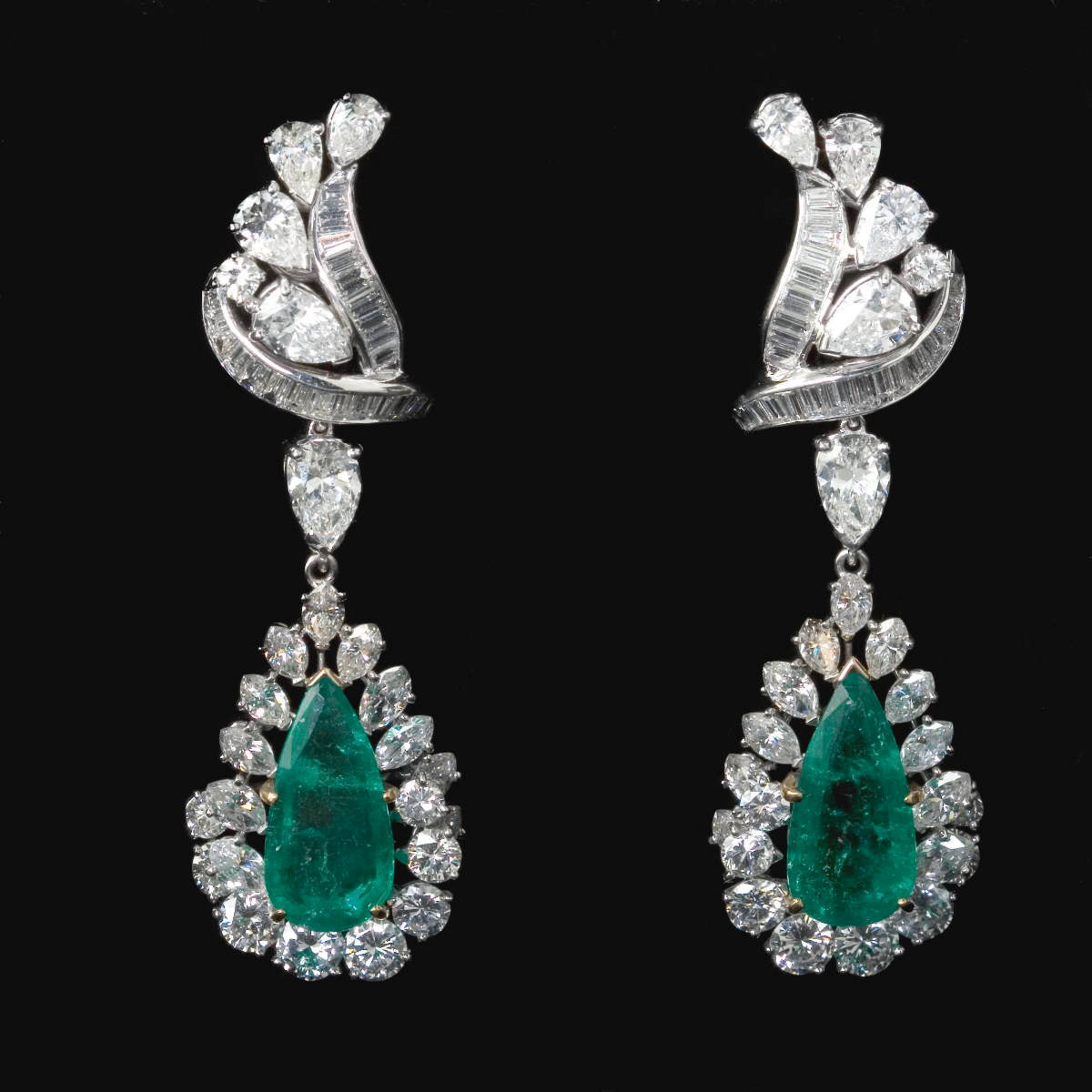 Appraisal: PAIR OF EMERALD DIAMOND AND PLATINUM EAR PENDANTS Each set