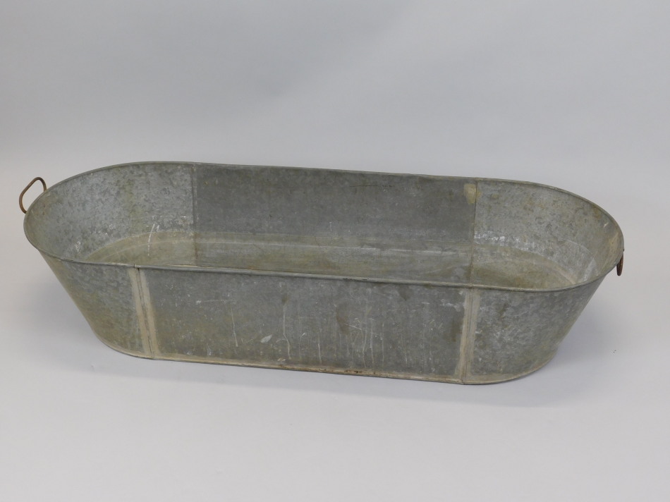 Appraisal: An early thC tin bath with one handle cm long