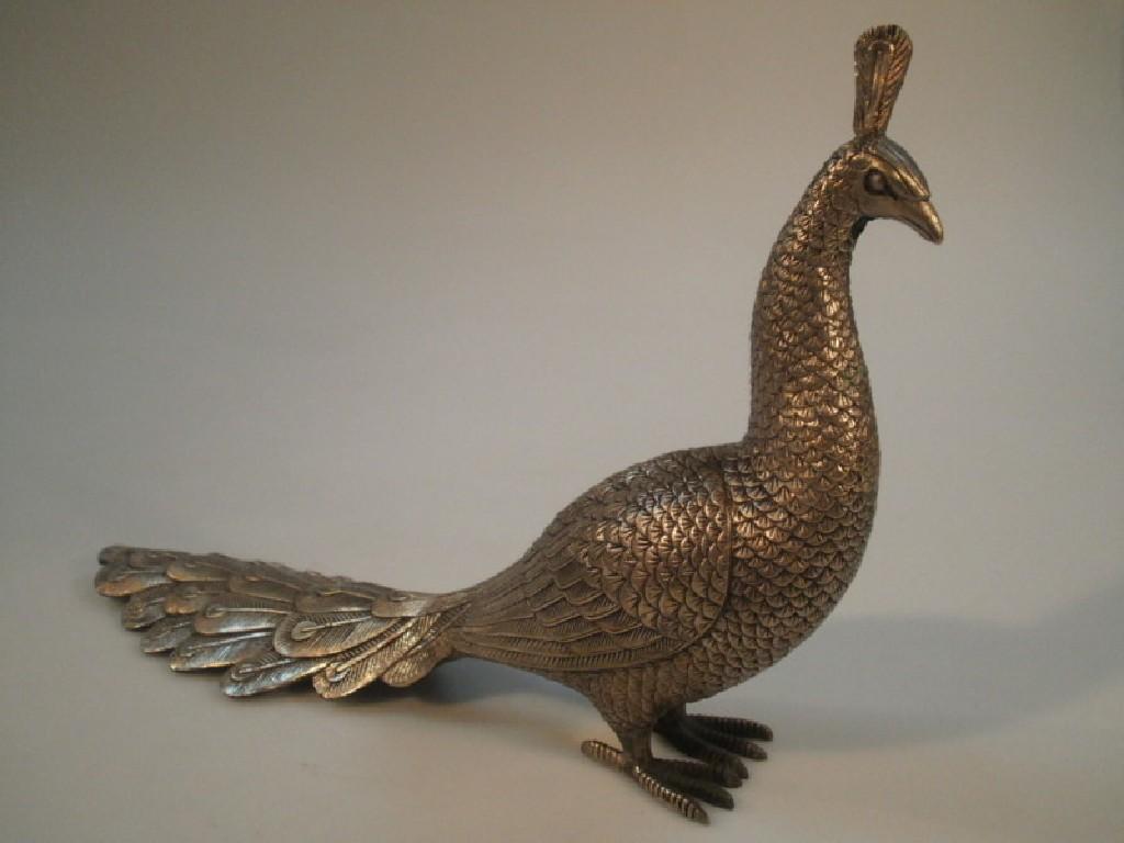 Appraisal: A Chinese bronze and gilt peacock