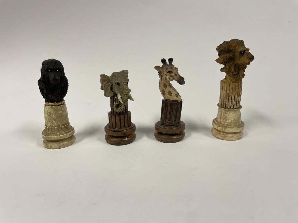 Appraisal: Chess board and chess set pieces with the heads of