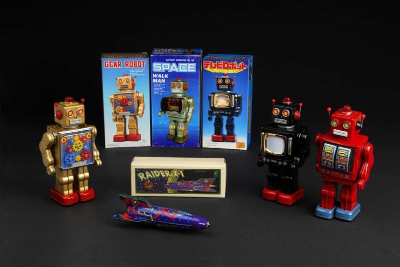 Appraisal: Lot of Tin Contemporary Robot Space Toys Description Consists of