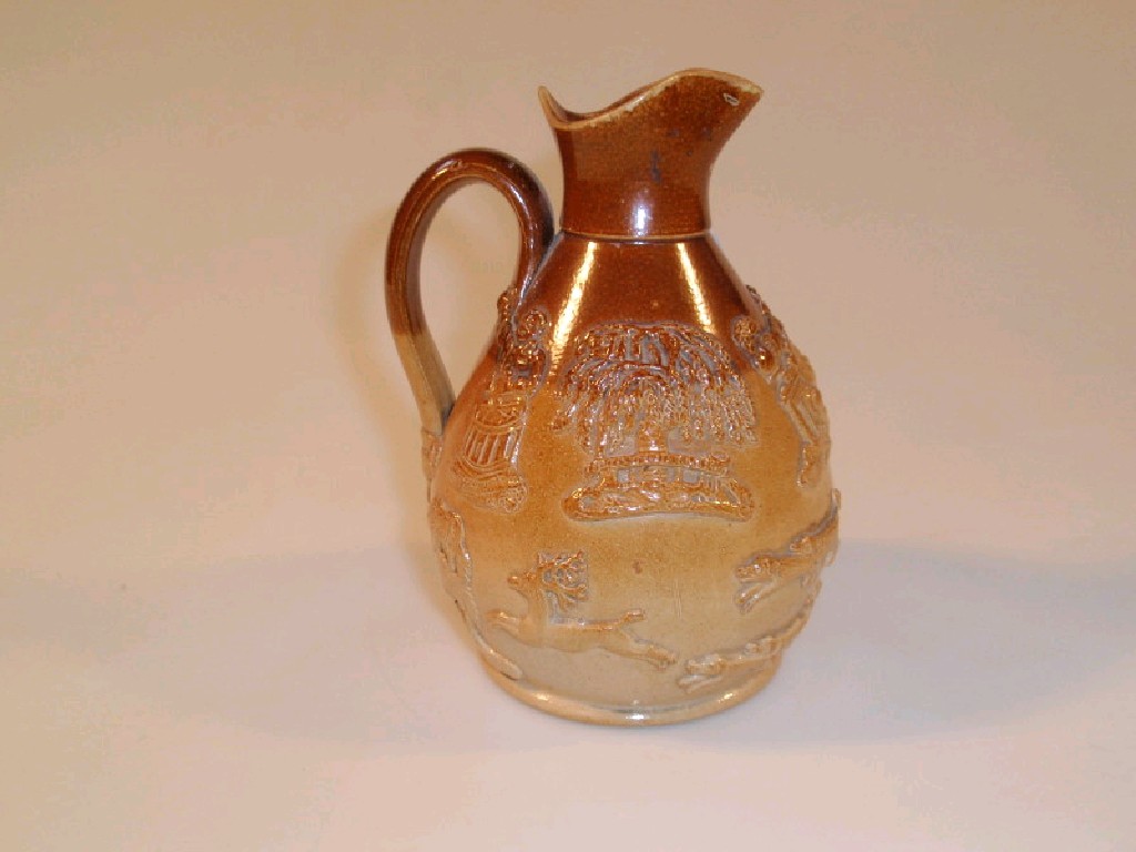 Appraisal: A Doulton style stoneware jug of tapered ovoid form with