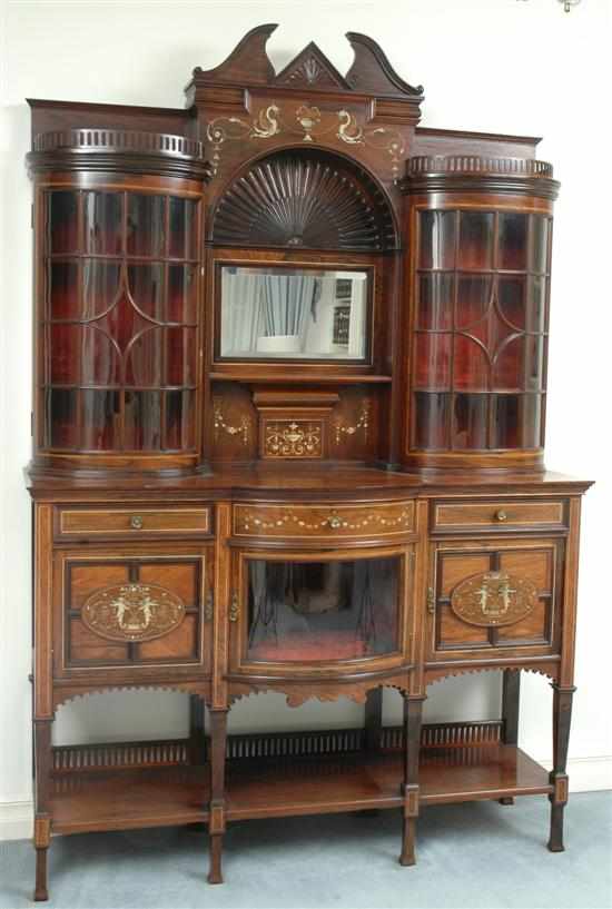 Appraisal: A fine quality late Victorian rosewood and marquetry sideboard The