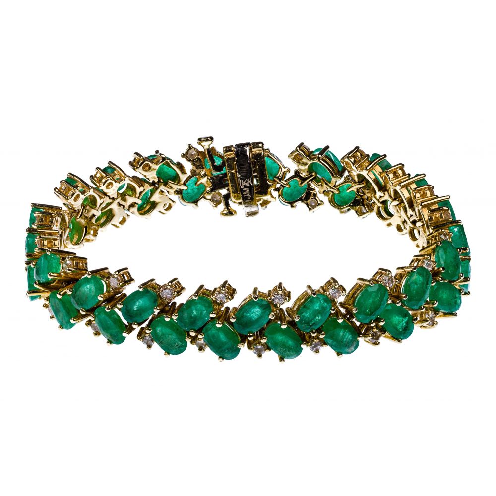 Appraisal: K YELLOW GOLD EMERALD AND DIAMOND BRACELETHaving oval cut emeralds