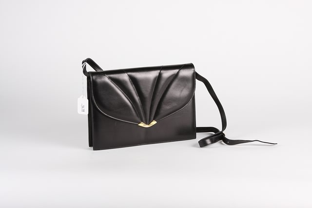 Appraisal: Salvatore Ferragamo black leather clutch bag with shoulder strap Good