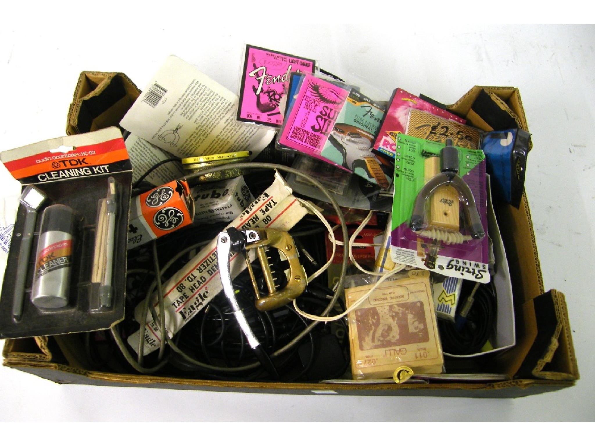 Appraisal: Box containing a quantity of guitar spares to include strings