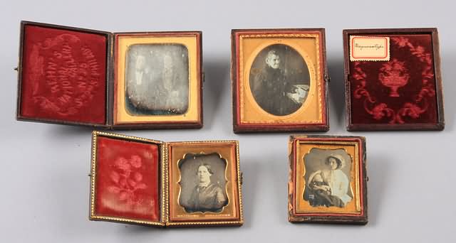 Appraisal: Grouping of portrait daguerreotypes Sixth plate portrait of seated man