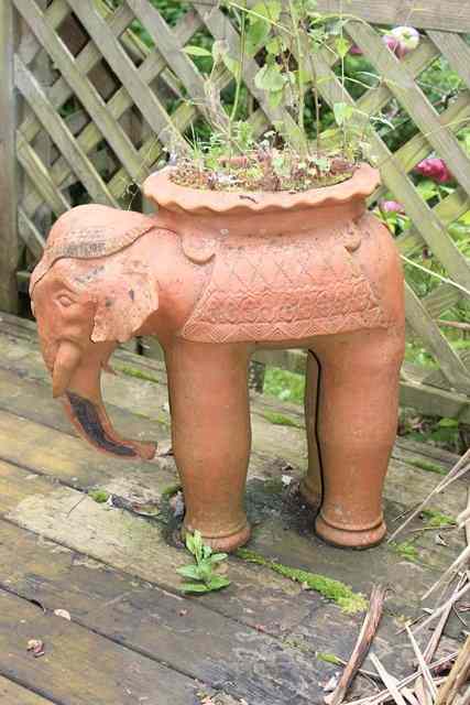 Appraisal: A PAIR OF WHICHFORD POTTERY TERRACOTTA ELEPHANT PLANTERS high frost