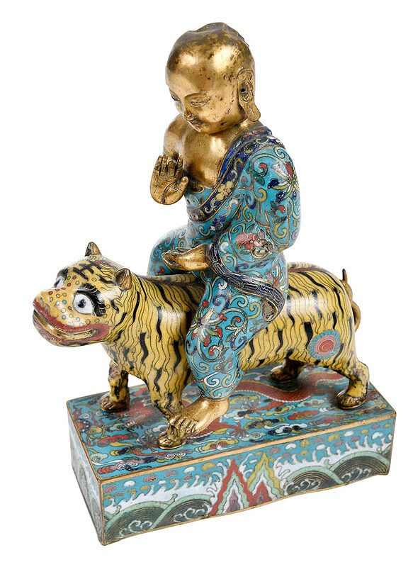 Appraisal: A Chinese Cloisonne Figure Riding a Tiger Qing probably Kangxi