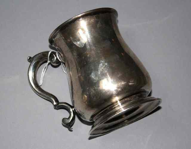 Appraisal: A GEORGE II SILVER BALUSTER SHAPED TANKARD of plain form